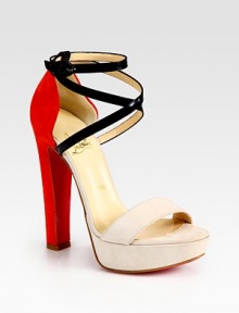 Backed by alarmingly vibrant suede, this smooth leather go-to has adjustable criss-cross straps and a contrasting front. Self-covered heel, 5½ (140mm)Covered platform, 1 (15mm)Compares to a 4½ heel (115mm)Suede and leather upperLeather liningSignature red leather solePadded insoleMade in ItalyOUR FIT MODEL RECOMMENDS ordering true size. Backed by alarmingly vibrant suede, this smooth leather go-to has adjustable criss-cross straps and a contrasting front. Self-covered heel, 5½ (140mm)Covered platform, 1 (15mm)Compares to a 4½ heel (115mm)Suede and leather upperLeather liningSignature red leather solePadded insoleMade in ItalyOUR FIT MODEL RECOMMENDS ordering true size.