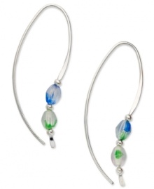 A sweep of color and a bit of polish. Jody Coyote's pretty loop earrings are crafted in sterling silver with silver and Czech glass accent beads in blue and green. Approximate drop: 1-1/2 inches. A sweep of color and a bit of polish. Jody Coyote's pretty loop earrings are crafted in sterling silver with silver and Czech glass accent beads in blue and green. Approximate drop: 1-1/2 inches.