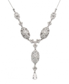 An elegant Y. Eliot Danori's intricate drop necklace features unique, oval-shaped links decorated with sparkling crystals and round-cut cubic zirconias (1 ct. t.w.). Set in silver tone mixed metal. Approximate length: 16 inches + 2-inch extender. Approximate drop: 4-1/2 inches. An elegant Y. Eliot Danori's intricate drop necklace features unique, oval-shaped links decorated with sparkling crystals and round-cut cubic zirconias (1 ct. t.w.). Set in silver tone mixed metal. Approximate length: 16 inches + 2-inch extender. Approximate drop: 4-1/2 inches.