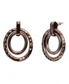 Warm colors blend perfectly with any look. Monet's bronze tone mixed metal drop hoops feature smooth and textured surfaces and a double circle design. Approximate drop: 1-1/4 inches. Warm colors blend perfectly with any look. Monet's bronze tone mixed metal drop hoops feature smooth and textured surfaces and a double circle design. Approximate drop: 1-1/4 inches.