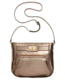Make a move to metallic and give you're look an instant update with this compact crossbody from Calvin Klein. Soft, supple leather is finished with detail stitching and golden turnlock accent, while zipped compartments inside and out keep your essentials safe and secure. Make a move to metallic and give you're look an instant update with this compact crossbody from Calvin Klein. Soft, supple leather is finished with detail stitching and golden turnlock accent, while zipped compartments inside and out keep your essentials safe and secure.