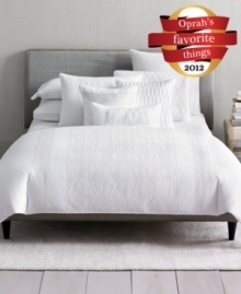 Make a reservation to unwind! This Hotel Collection Embroidered Diamonds sham evokes tranquility with an all white landscape of understated quilted geometric patterns. Zipper closure.