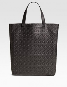 Clover embossed leather adds textural interest to this versatile daytime essential.Double top handles, 6 drop Open top One inside zip pocket 16W X 17H X 3D Imported Clover embossed leather adds textural interest to this versatile daytime essential.Double top handles, 6 drop Open top One inside zip pocket 16W X 17H X 3D Imported