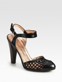 Mesh-like woven leather style with a stacked heel and an adjustable slingback strap. Stacked heel, 4 (100mm)Leather upperLeather liningRubber solePadded insoleImportedOUR FIT MODEL RECOMMENDS ordering one half size up as this style runs small. 