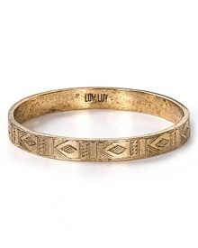 Give in to wanderlust with this Afghani-inspired bangle from Low Luv by Erin Wasson. It's a go-to gilded style that hints at well-travelled chic.