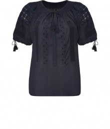 Raise the bar on contemporary classics with Closeds boho-chic navy tunic top - In a soft, semi-sheer summer viscose - On trend, allover embroidery and decorative tie embellishments - Short puffed sleeves and gathered keyhole tie neck - Relaxed, billowy silhouette - Casually cool, perfect for pairing with shorts, skinny denim and slim, cropped trousers