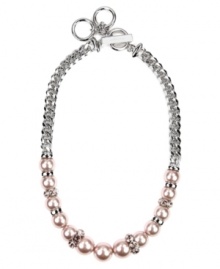 Classic elegance. Givenchy's gorgeous design combines rosy glass pearls and sparkling mauve-tone crystals in a chic twisted collar setting. Crafted in imitation rhodium-plated mixed metal. Approximate length: 16 inches + 2-1/2-inch extender.