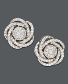Not your average studs. Wrap your ears in sparkle with this chic, knotted design by Wrapped in Love(tm). Set in 14k white gold, earrings features dozens of pave-set, round-cut diamonds. Approximate diameter: 1 inch. Not your average studs. Wrap your ears in sparkle with this chic, knotted design by Wrapped in Love(tm). Set in 14k white gold, earrings features dozens of pave-set, round-cut diamonds. Approximate diameter: 1 inch.