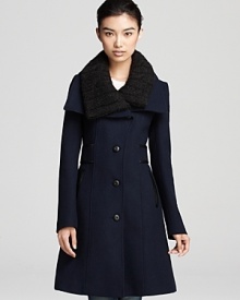 A luxe cashmere collar and decorative belt with double leather trim give the Mackage jacket on-trend caché this season.