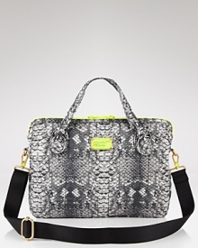 For the closet nerd, MARC BY MARC JACOBS' color-pop computer bag is the ultimate in geek chic. Carry this nylon case to be plugged in and pretty. For the closet nerd, MARC BY MARC JACOBS' color-pop computer bag is the ultimate in geek chic. Carry this nylon case to be plugged in and pretty.