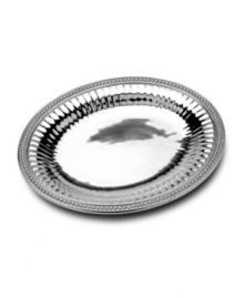 One of Wilton Armetale's most classic designs, based off a popular candlestick pattern from the early 1800's, the Flutes and Pearls Large Oval Tray brings the class of a bygone era to your table. One of Wilton Armetale's most classic designs, based off a popular candlestick pattern from the early 1800's, the Flutes and Pearls Large Oval Tray brings the class of a bygone era to your table.