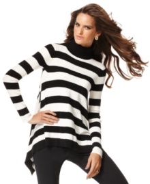 Bold stripes create a graphic look on INC's swingy tunic sweater. A touch of cashmere gives it extra-soft appeal! Bold stripes create a graphic look on INC's swingy tunic sweater. A touch of cashmere gives it extra-soft appeal!