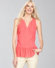 Try out the silhouette of the season -- the peplum -- with INC's petite top. A charming addition to any wardrobe. Try out the silhouette of the season -- the peplum -- with INC's petite top. A charming addition to any wardrobe.