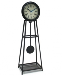 Enjoy every moment at home with this wrought iron clock. A working pendulum hypnotizes everyone around your table with grand, traditional style. Black metal hands point to bold Roman numerals on a classic off-white dial. Enjoy every moment at home with this wrought iron clock. A working pendulum hypnotizes everyone around your table with grand, traditional style. Black metal hands point to bold Roman numerals on a classic off-white dial.