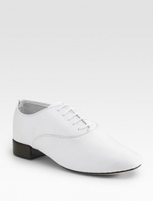 Classic leather oxford styling with a sleek, feminine silhouette. Stacked heel, ¾ (20mm) Lace-up front Fine-grained leather Leather sole Made in FranceOUR FIT MODEL RECOMMENDS ordering true size.. 