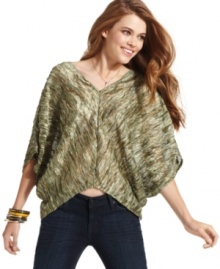 Couture inspiration is in full supply on this oversized, knit pullover from Jessica Simpson!