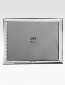 Classic and sophisticated in groove-trimmed sterling silver. From the Grooves CollectionFits horizontal photosMade in SpainDIMENSION INFORMATION4 X 6 (5 X 7 overall)5 X 7 (7 X 9 overall)8 X 10 (10 X 12 overall)FOR PERSONALIZATIONSelect a quantity, then scroll down and click on PERSONALIZE & ADD TO BAG to choose and preview your monogramming options. Please allow 2 weeks for delivery. Classic and sophisticated in groove-trimmed sterling silver. From the Grooves CollectionFits horizontal photosMade in SpainDIMENSION INFORMATION4 X 6 (5 X 7 overall)5 X 7 (7 X 9 overall)8 X 10 (10 X 12 overall)FOR PERSONALIZATIONSelect a quantity, then scroll down and click on PERSONALIZE & ADD TO BAG to choose and preview your monogramming options. Please allow 2 weeks for delivery.