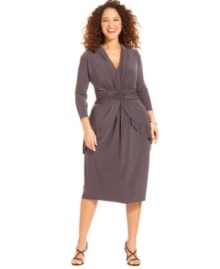 Jones New York's latest plus size look features flattering details, like a brooch-adorned, ruched waistband and peplum tiers at the hips. Jones New York's latest plus size look features flattering details, like a brooch-adorned, ruched waistband and peplum tiers at the hips.