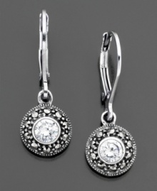 Round-cut cubic zirconia (1 ct. t.w.) surrounded by a burst of beautiful marcasite. Earrings by Judith Jack set in sterling silver. Approximate drop: 1 inch.