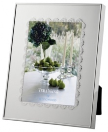 A delicate lace-inspired pattern trims sleek silver plate, giving Vera Wang's Flirt picture frame a sense of timeless grace and femininity.