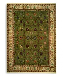 Inspired by 18th-century Persian tapestries, this rug features a vinery trellis motif in a lush palette of color that includes spice reds, soft blues and warm browns. A distinctive border of flowering shrubs and cypresses perfectly frames the rich color shadings of the sage green ground. Each color is individually skein-dyed for jewel-tone clarity and stunning depth. A patented luster wash imparts a vintage finish faithful to the craftsmanship of the original. Inspired by 18th-century Persian tapestries, this rug features a vinery trellis motif in a lush palette of color that includes spice reds, soft blues and warm browns. A distinctive border of flowering shrubs and cypresses perfectly frames the rich color shadings of the sage green ground. Each color is individually skein-dyed for jewel-tone clarity and stunning depth. A patented luster wash imparts a vintage finish faithful to the craftsmanship of the original.