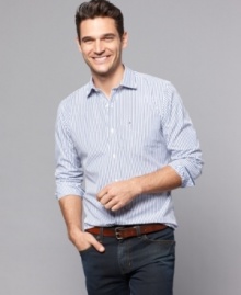 Create a long, lean silhouette with this slim-fit striped shirt from Tommy Hilfiger. Create a long, lean silhouette with this slim-fit striped shirt from Tommy Hilfiger.