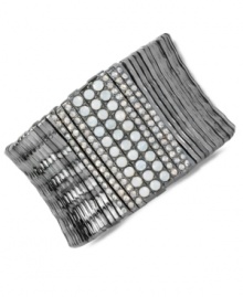 Both bold and beautiful, Kenneth Cole New York's segmented stretch bracelet is crafted from hematite-tone mixed metal. Glass opal-colored crystal pave accents provide the perfect amount of sparkle. Approximate length: 7-1/2 inches. Both bold and beautiful, Kenneth Cole New York's segmented stretch bracelet is crafted from hematite-tone mixed metal. Glass opal-colored crystal pave accents provide the perfect amount of sparkle. Approximate length: 7-1/2 inches.