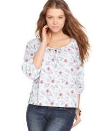 Adorable with denim, this Levi's® floral printed peasant blouse is the perfect top for an understated boho look! Adorable with denim, this Levi's® floral printed peasant blouse is the perfect top for an understated boho look!