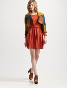 Cropped, wool-rich topper in a bold, multicolored pattern with an uneven, notched back hem and three-quarter sleeves. V-neckHook-and-eye closureDropped shouldersThree-quarter sleevesNotched back hemAbout 16 from shoulder to hem73% wool/27% polyesterDry cleanMade in USA of Italian fabricModel shown is 5'9½ (176cm) wearing US size 2.