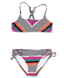 Poolside style. She'll love the cute look of this two-piece swimsuit from Roxy, perfect for the pool or the beach. Poolside style. She'll love the cute look of this two-piece swimsuit from Roxy, perfect for the pool or the beach.