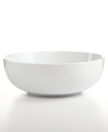 Purely casual and modern with its simple shape, this Whiteware round vegetable bowl adds a perfect, helpful accent to every gathering. Purely casual and modern with its simple shape, this Whiteware round vegetable bowl adds a perfect, helpful accent to every gathering.
