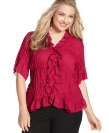 Flaunt your feminine flair this fall with NY Collection's elbow sleeve plus size blouse, accented by ruffled trim.