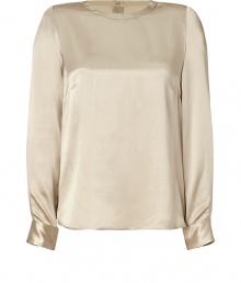 Sophisticated and sexy top in fine champagne-colored silk - Narrow, straight cut creates a sleek look - Features a rounded neck, long sleeves and rounded hem - Decorative full placket at back - Style with skinny jeans, pencil skirt or leather pants