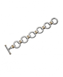 Sophisticated simplicity. This bracelet from the Lauren by Ralph Lauren collection features silvertone links in mixed metal and goldtone connectors. Toggle clasp. Approximate length: 8 inches.