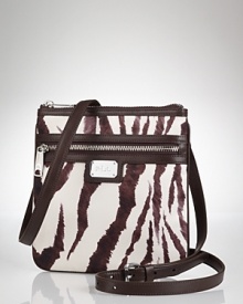 Hit print with this nylon crossbody bag from Lauren by Ralph Lauren, boasting bold stripes, leather finishes and a just right size. Hit print with this nylon crossbody bag from Lauren by Ralph Lauren, boasting bold stripes, leather finishes and a just right size.