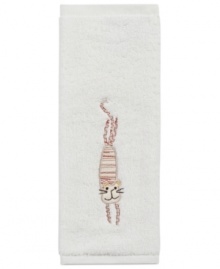 Animal attraction. A super-soft cotton washcloth embellished with a friendly feline turns tub time into fun time.