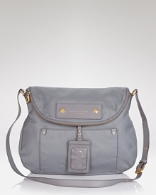 Strike a versatile note with MARC BY MARC JACOBS' nylon crossbody. Go back to basics: This practical bag is designed to keep pace with whatever your day (or closet) has planned. Strike a versatile note with MARC BY MARC JACOBS' nylon crossbody. Go back to basics: This practical bag is designed to keep pace with whatever your day (or closet) has planned.