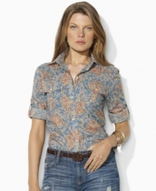 Lauren Jeans Co.'s breezy cotton shirt updates the classic workwear style with a vibrant floral pattern and chic rolled sleeves.