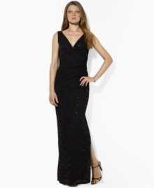 Lauren Ralph Lauren's sweeping lace gown is adorned with shimmering sequins and gentle ruching for a standout evening look.