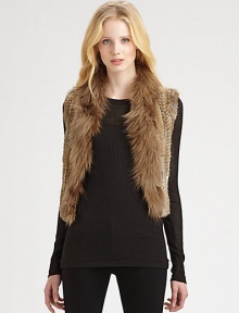 Layer up in a cropped, alarmingly chic rabbit fur vest with a dyed coyote fur shawl collar. Dyed coyote fur shawl collarSleevelessAbout 20 from shoulder to hemBody: Dyed rabbit furTrim: Dyed coyote furDry clean with fur specialistMade in USARabbit fur origin: ChinaCoyote fur origin: USAModel shown is 5'10 (177cm) wearing US size Small. Layer up in a cropped, alarmingly chic rabbit fur vest with a dyed coyote fur shawl collar. Dyed coyote fur shawl collarSleevelessAbout 20 from shoulder to hemBody: Dyed rabbit furTrim: Dyed coyote furDry clean with fur specialistMade in USARabbit fur origin: ChinaCoyote fur origin: USAModel shown is 5'10 (177cm) wearing US size Small.