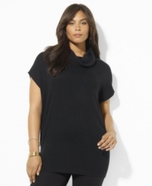A modern jersey-knit plus size sweater silhouette is crafted with a funnel neckline and short dolman sleeves. A modern jersey-knit plus size sweater silhouette is crafted with a funnel neckline and short dolman sleeves.