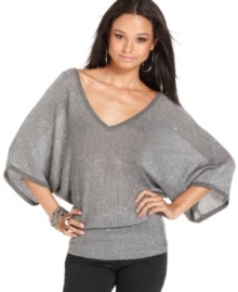 Get your shine on in this sequin top from Baby Phat! Featuring three-quarter dolman sleeves and a dramatic front and back V-neck, this flirty top is perfect for a night on the town! Get your shine on in this sequin top from Baby Phat! Featuring three-quarter dolman sleeves and a dramatic front and back V-neck, this flirty top is perfect for a night on the town!