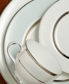 Set the table with elegance. A slightly textured pearlescent and platinum border melds with creamy white bone china to bring grace and style to any decor. Accent plate not shown. Set the table with elegance. A slightly textured pearlescent and platinum border melds with creamy white bone china to bring grace and style to any decor. Accent plate not shown.