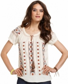 A vintage look for the modern bohemian -- get it with this Lucky Brand Jeans peasant top. Featuring needlepoint embroidery and a chic tassel tie at the neckline, it's all about the details.