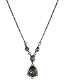 Front and center in fashion. Givenchy shines with this Y-shaped necklace crafted from hematite-tone mixed metal with glass stones adorning it. The pendant glistens with cubic zirconia accents. Approximate length: 16 inches + 2-inch extender.