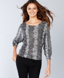 Snakeskin print goes downtown with a raglan-sleeve, slouchy-chic top from INC! There's a surprise in back, too -- a slightly sheer solid inset! (Clearance)