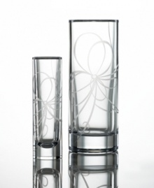 Ribbons of frosted glass enhance this cool cylindrical bud vase (shown left). Create a stylish presentation of an everyday wildflower or coordinate with the rest of the Belle Boulevard collection for soft, modern home decorating.