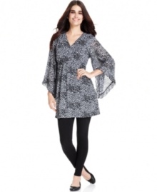 This animal-print tunic from Style&co. makes quite the impact with dramatic, asymmetrical bell sleeves and rhinestone studding.