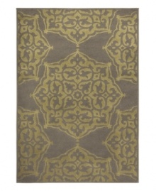 A classic medallion design is brought to life in lush hues of green and grey in this Zanzibar area rug from Sphinx. Its streamlined, low-cut pile and durable construction offer a handsome, lasting finish to any room. (Clearance) A classic medallion design is brought to life in lush hues of green and grey in this Zanzibar area rug from Sphinx. Its streamlined, low-cut pile and durable construction offer a handsome, lasting finish to any room. (Clearance)