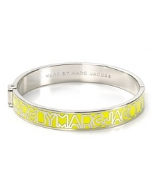 MARC BY MARC JACOBS' enamel bangle has designer appeal. Emblazoned with the label's logo, this simple silvery bracelet has fashion forward written all over it.